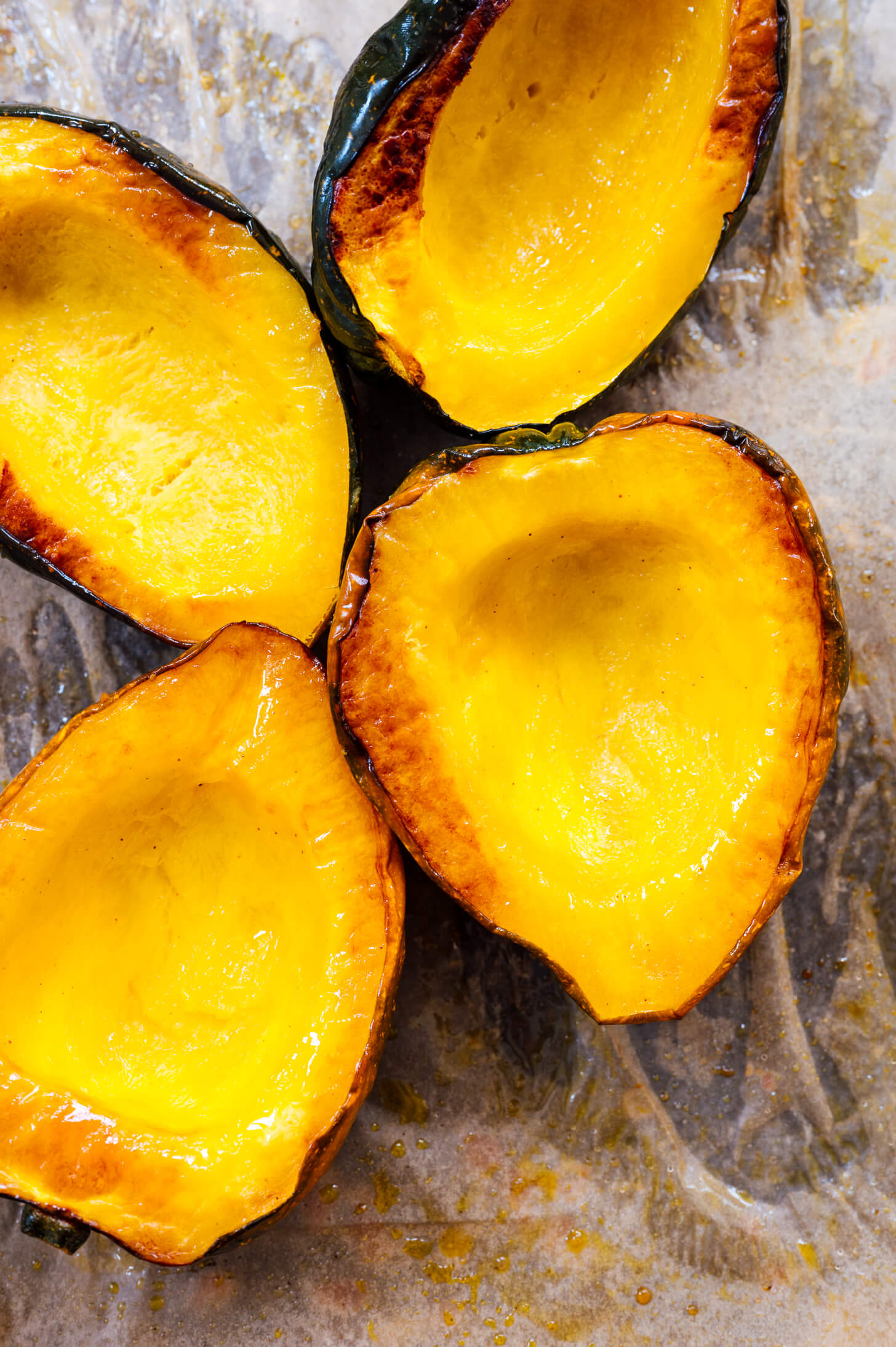 roasted acorn squash on pan