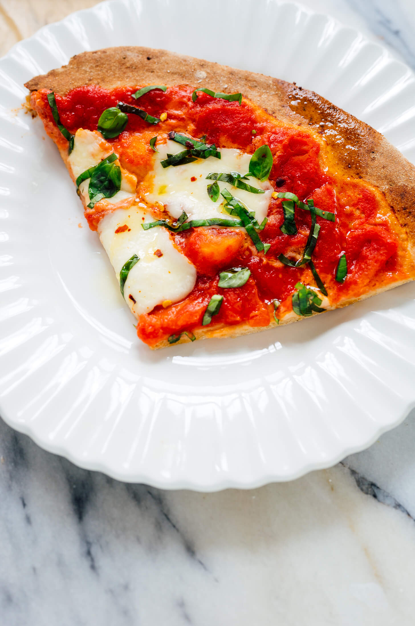 slice of margherita pizza